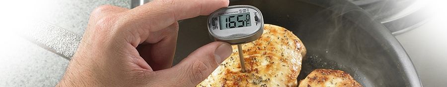 close up of a thermometer in a chicken