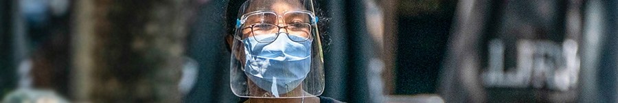 Person with a mask and visor on