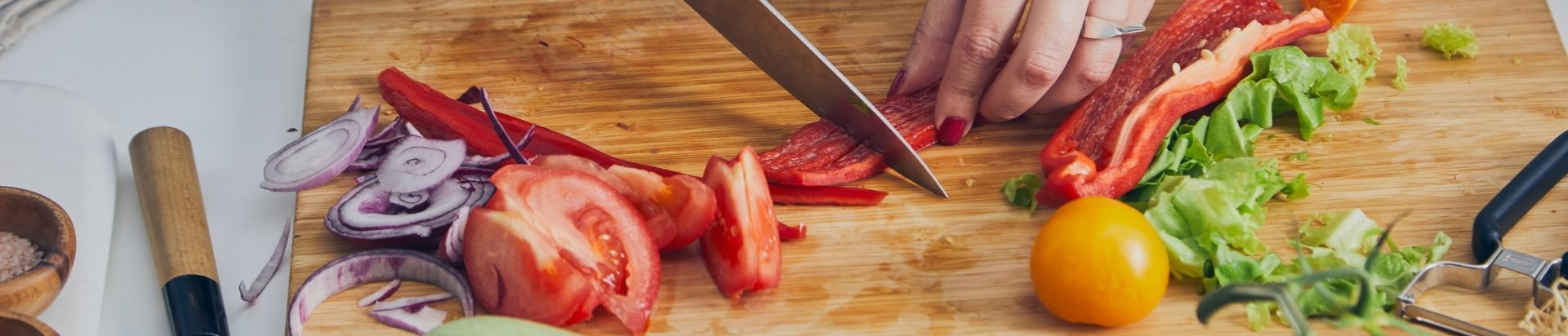 Close up of a person preparing vegetables