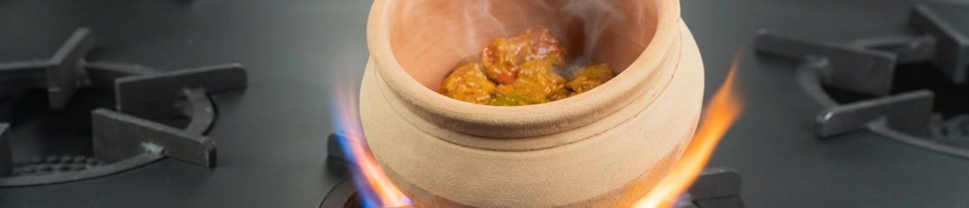 Close up of a matka pot on a hob