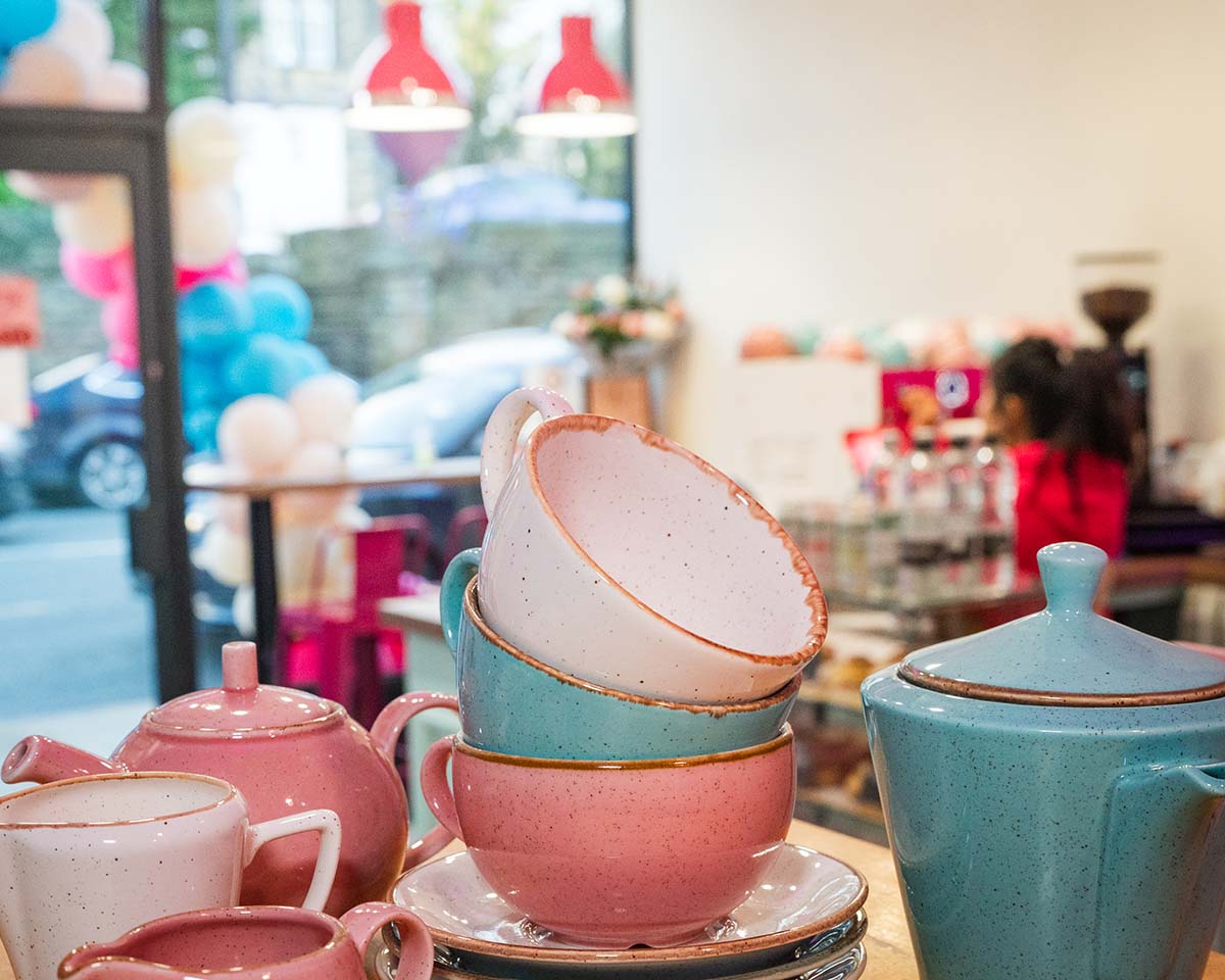 Selection of cups and crockery from Cooksmill in the cafe