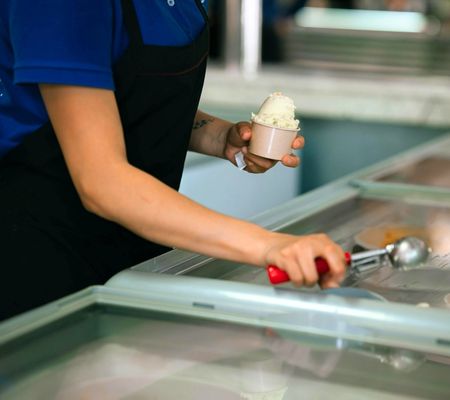 server scooping ice cream