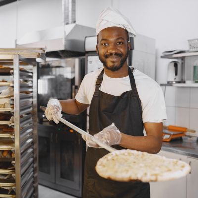 chef with pizza peel chef with pizza peel