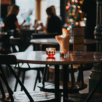 Restaurant table with a candle and napkins Restaurant table with a candle and napkins