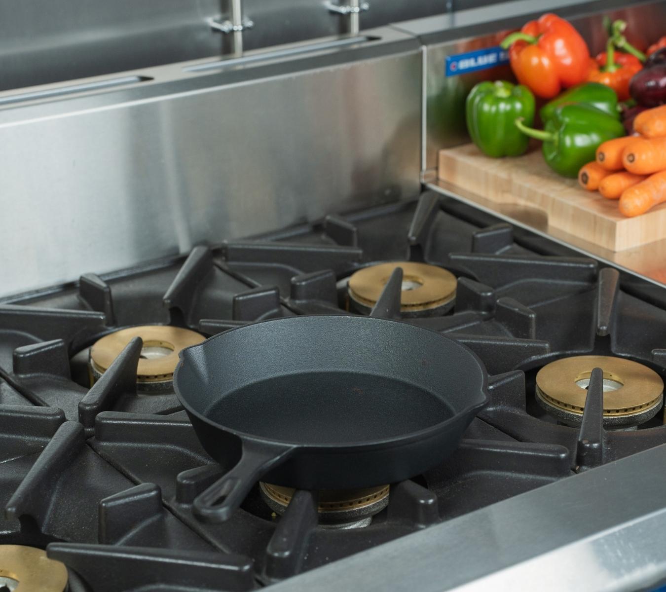 Cast iron pan on an oven hob