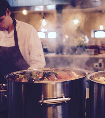 Chef with a stock pot