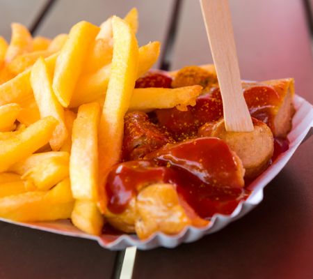 Currywurst sytle hotdogs with fries