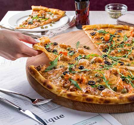 Eating a pizza