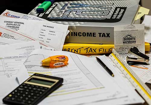 Financial documents and a calculator