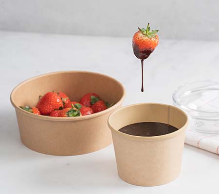 Take out pot with chocolate sauce and strawberries