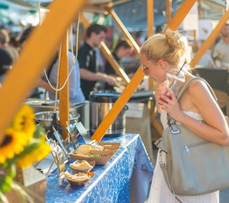 Customer looking at food at a festival