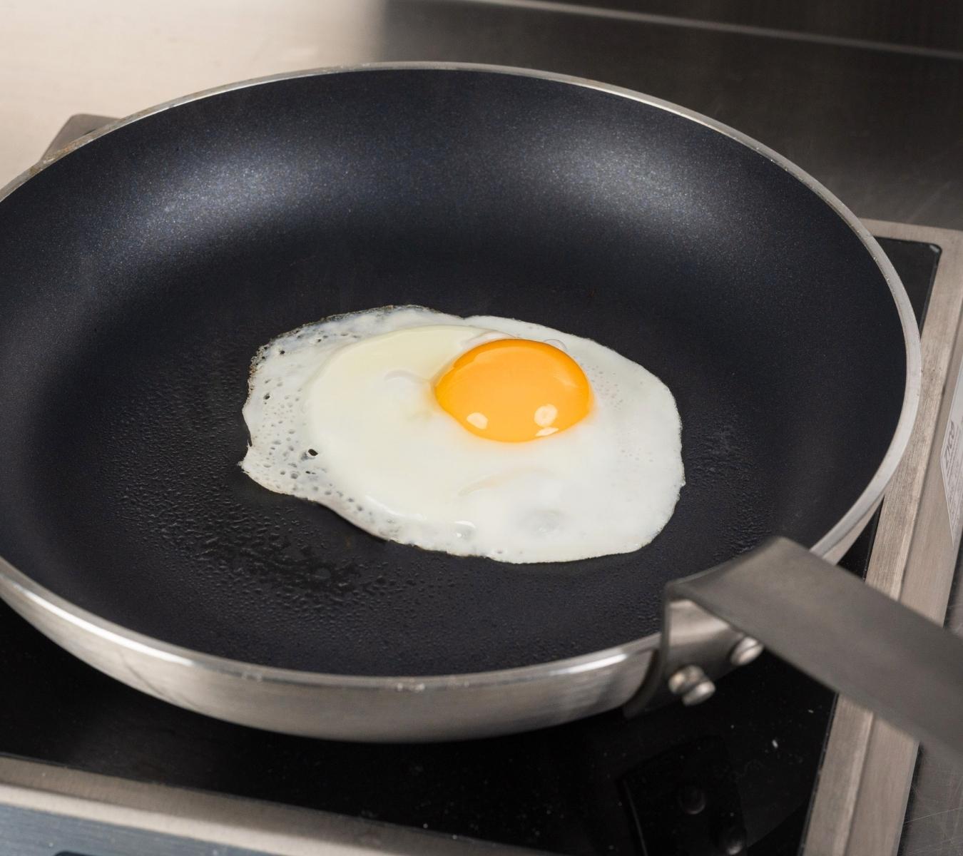 Egg frying in a frying pan