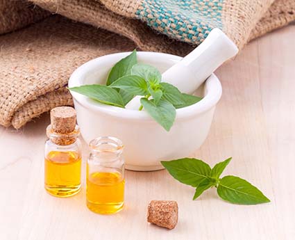 Pestle and mortar with herbs and spices