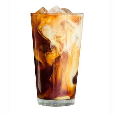 Swirling iced coffee in a glass