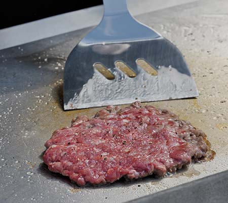 Cooking a burger outside