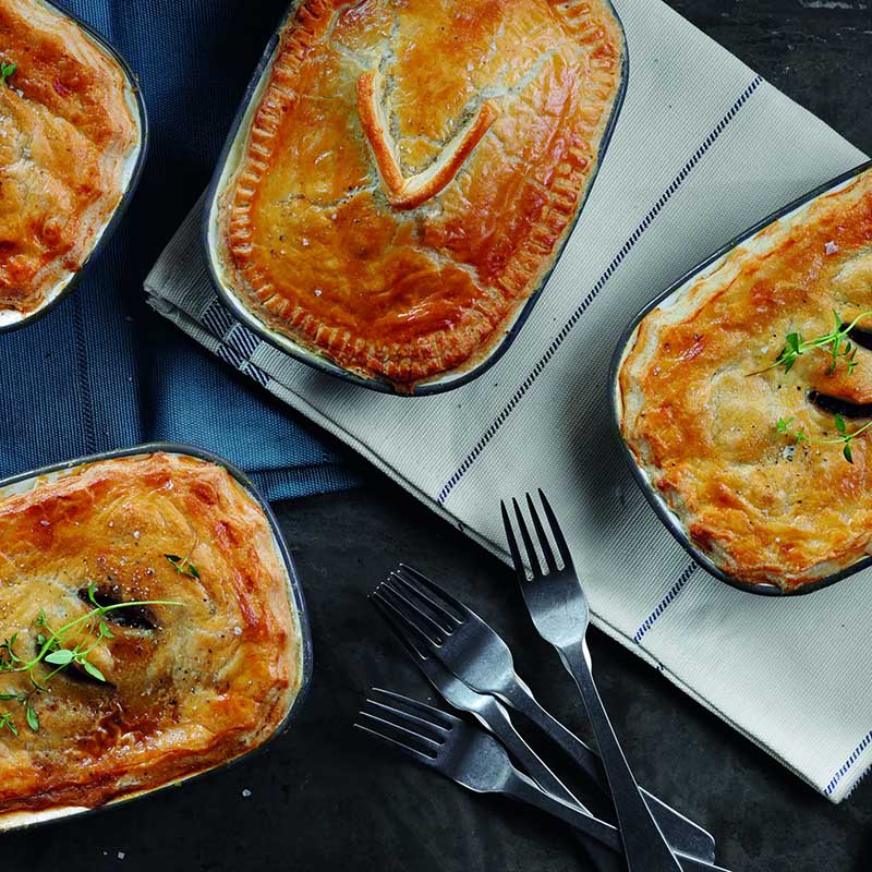 Chicken and leek pies on a table