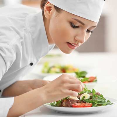 Chef plating food
