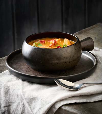 Soup in a rustic bowl
