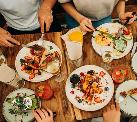Group of people eating breakfast