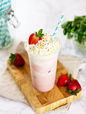 Drink with a compostable straw