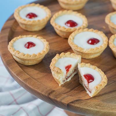 Bakewell tarts on a cake stand