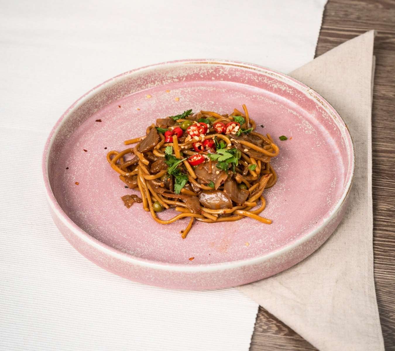 Food presented in a pink plate for attention on socials